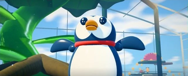 Pengi throws his flippers up in celebration inside the Bellows Orchard greenhouse.
